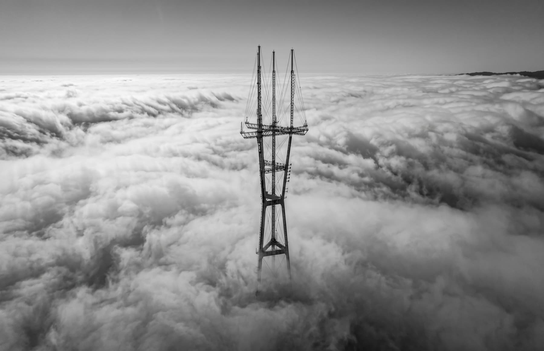 Sutro Tower rising above a sea of fog
